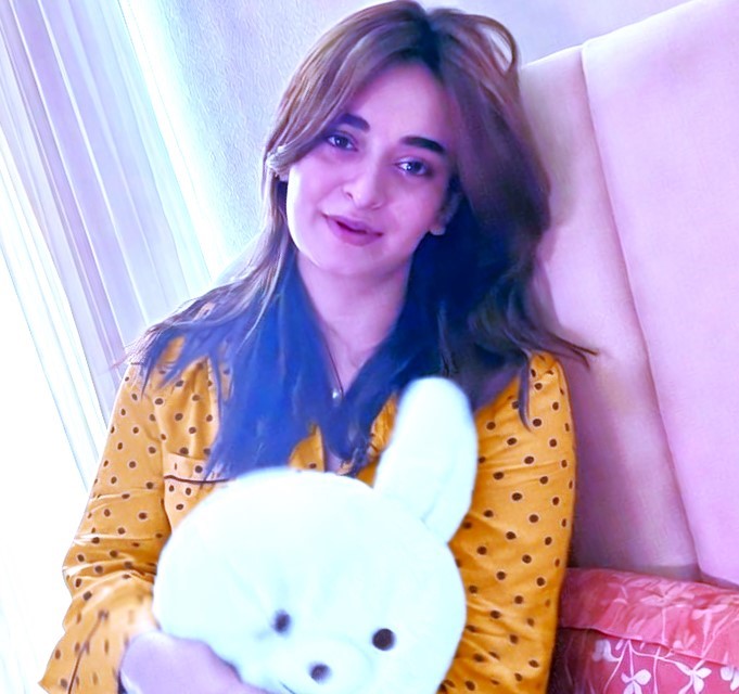 Television star in confident pose