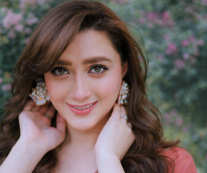 TV celebrity smiling during photoshoot