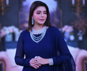TV host in stylish outfit