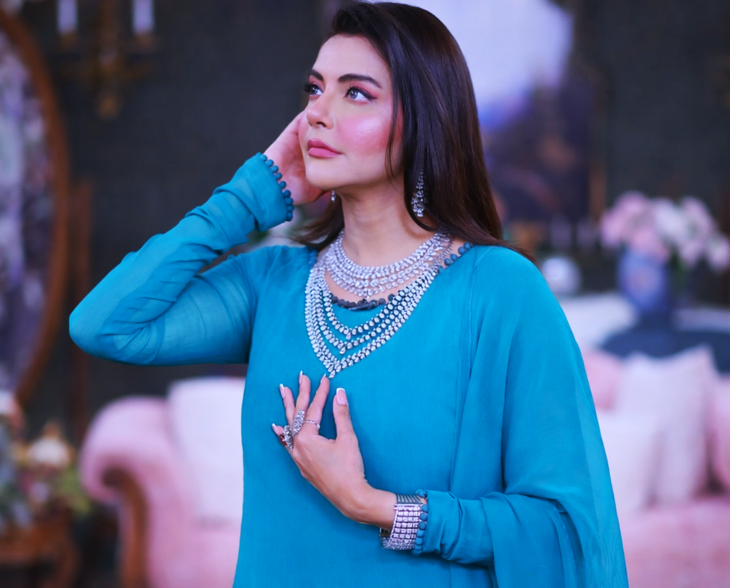 TV host in stylish outfit