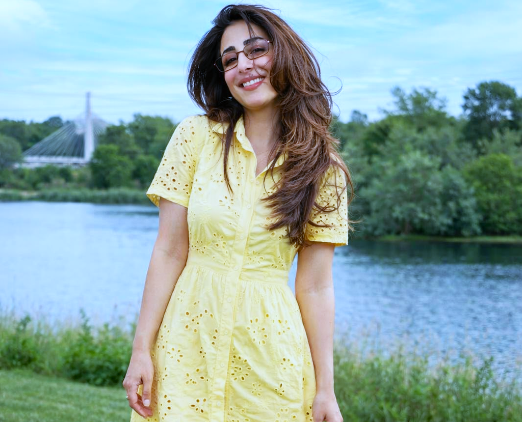 Film actress in trendy pose
