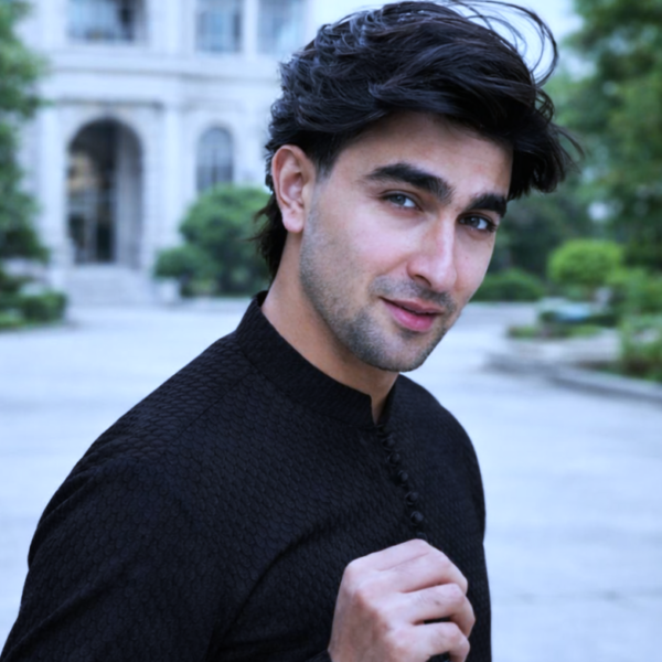 Actor in modern fashion attire